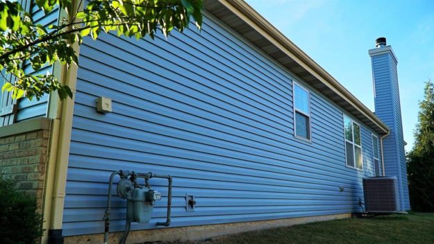 Blue siding and a blue chimney.