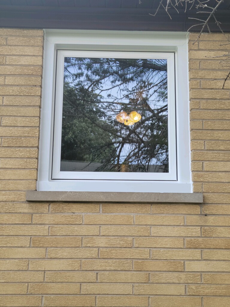 A picture window reflects light.