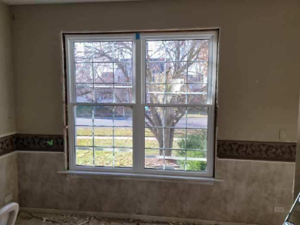 New windows being installed in a home