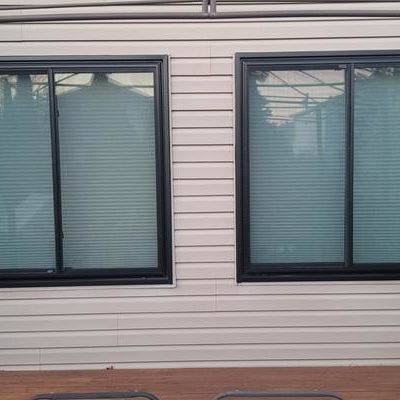 These black sliding windows make the frames pop.