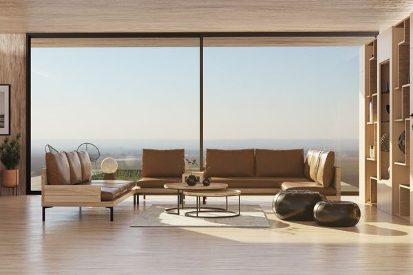 Two large picture windows in a living room