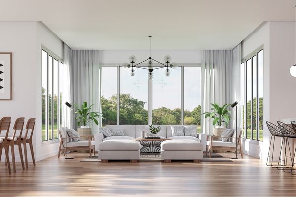 Living room with multiple sliding windows
