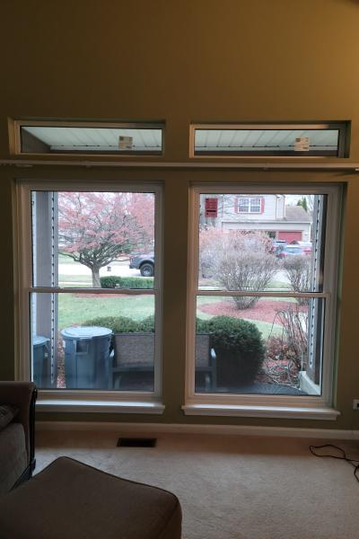 Double hung windows make clear the goings on outside