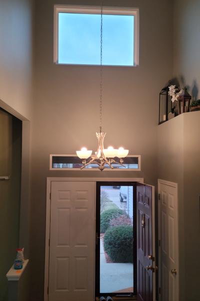 With new windows, this foyer invites more light and makes the space feel bigger
