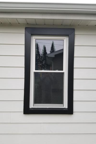 This new window enjoys a black, modern frame