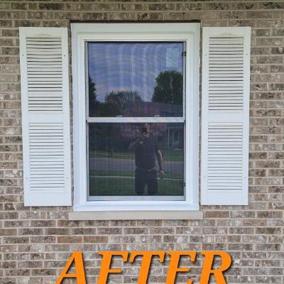 We installed this new window and new white shutters in McHenry, IL