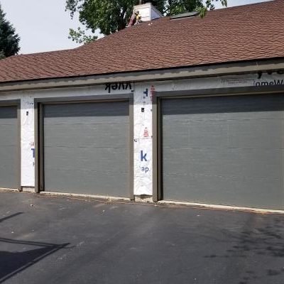 In this picture, we're about to weave siding among three garage doors in Grayslake, IL