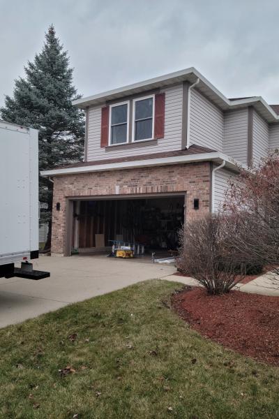 A truck is in a home's driveway