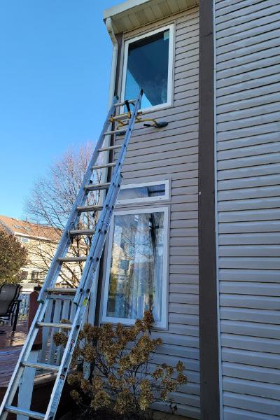 A ladder against the side of a home