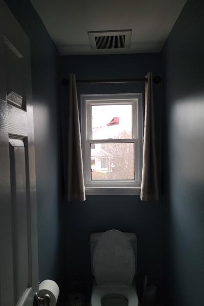 We installed a single double hung window in this small bathroom
