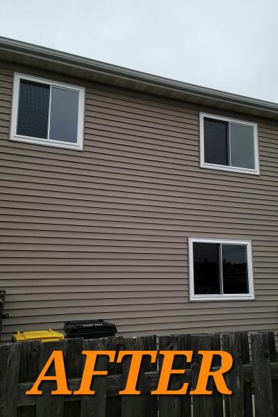 A tan home with new sliding windows in Lake in the Hills, IL