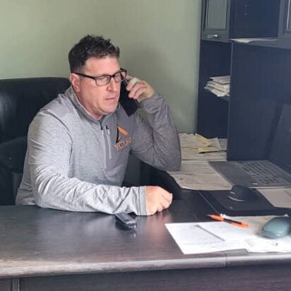 Window Replacement Company Owner Window replacement company owner Travis Williams at his desk