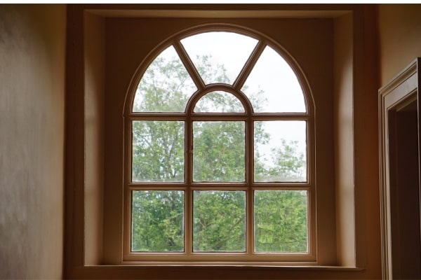 Arched windows letting in light from outside