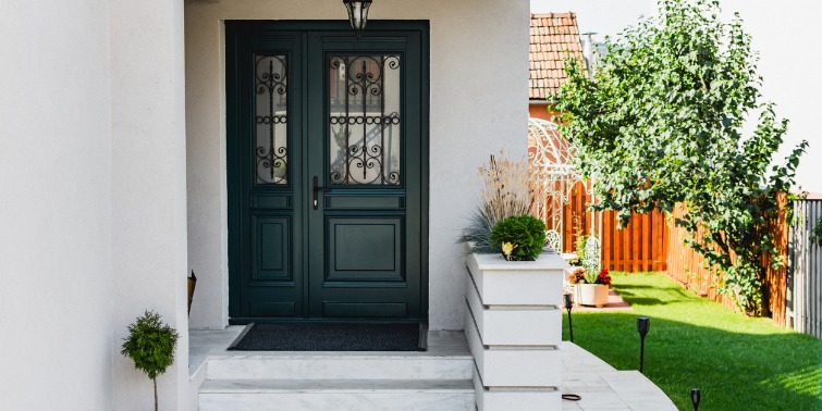 New Front Door On House Black front door with decorative iron on door windows